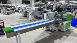 Машина Flow Pack для рисовых лепешек и шашлыков